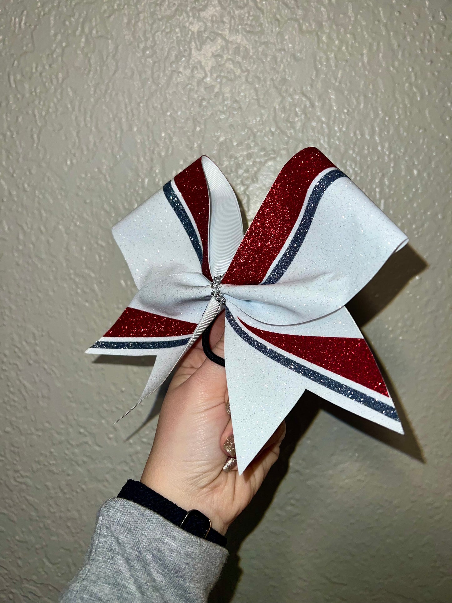 White Glitter with Red and Dark Silver Accents Bow